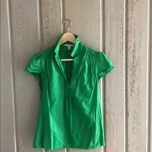 Green top with short sleeves